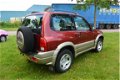 Suzuki Grand Vitara - 2.0 Metal Top Wide Body 4WD*airco*stuurbekr*2de eigenaar - 1 - Thumbnail