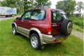 Suzuki Grand Vitara - 2.0 Metal Top Wide Body 4WD*airco*stuurbekr*2de eigenaar - 1 - Thumbnail