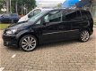 Volkswagen Touran - 2.0 TDI Highline BlueMotion AUTOMAAT= CAM&NAVI - 1 - Thumbnail