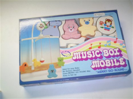Kraamcadeaus en Geboorteborden - Music box mobile. - 1
