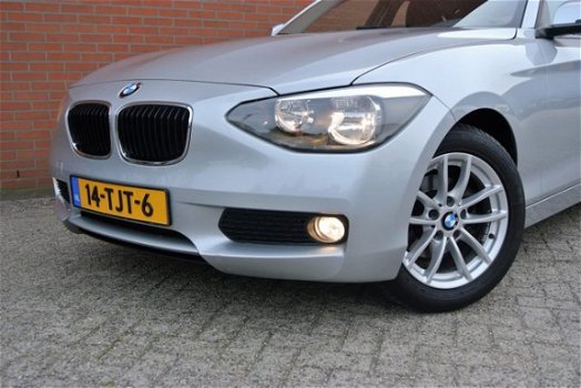 BMW 1-serie - 116i Business+ Automaat | Navi | Lage KM-stand | Rijklaarprijs - 1