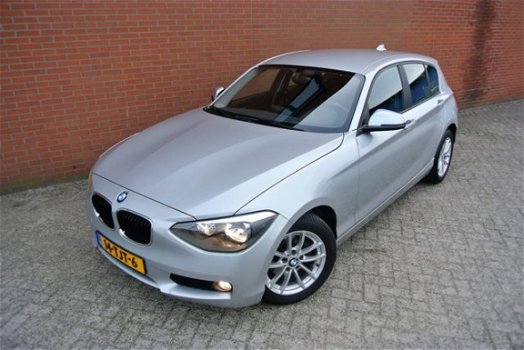 BMW 1-serie - 116i Business+ Automaat | Navi | Lage KM-stand | Rijklaarprijs - 1