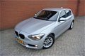 BMW 1-serie - 116i Business+ Automaat | Navi | Lage KM-stand | Rijklaarprijs - 1 - Thumbnail