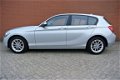 BMW 1-serie - 116i Business+ Automaat | Navi | Lage KM-stand | Rijklaarprijs - 1 - Thumbnail