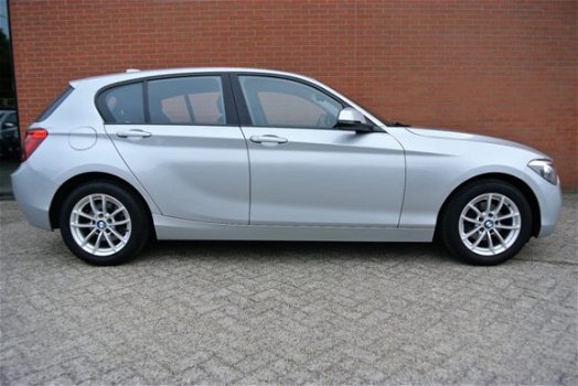 BMW 1-serie - 116i Business+ Automaat | Navi | Lage KM-stand | Rijklaarprijs - 1