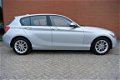 BMW 1-serie - 116i Business+ Automaat | Navi | Lage KM-stand | Rijklaarprijs - 1 - Thumbnail