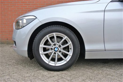 BMW 1-serie - 116i Business+ Automaat | Navi | Lage KM-stand | Rijklaarprijs - 1