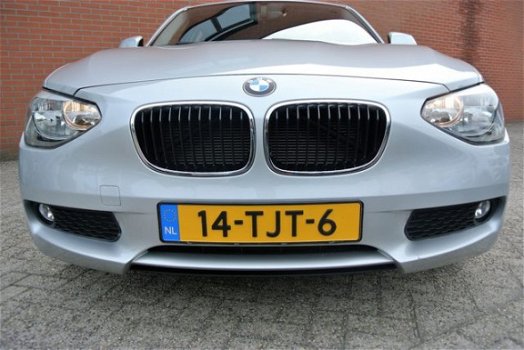 BMW 1-serie - 116i Business+ Automaat | Navi | Lage KM-stand | Rijklaarprijs - 1