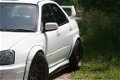 Subaru Impreza - 2.0 WRX AWD STi DCCD - 1 - Thumbnail