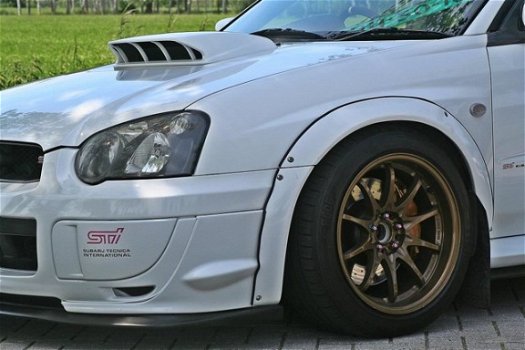 Subaru Impreza - 2.0 WRX AWD STi DCCD - 1