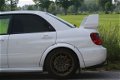 Subaru Impreza - 2.0 WRX AWD STi DCCD - 1 - Thumbnail