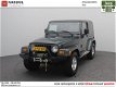 Jeep Wrangler - 4.0 Hardtop & Softtop Sahara | Rijklaarprijs | Airco | Cruise | LM | TH - 1 - Thumbnail