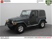 Jeep Wrangler - 4.0 Hardtop & Softtop Sahara | Rijklaarprijs | Airco | Cruise | LM | TH - 1 - Thumbnail