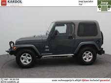 Jeep Wrangler - 4.0 Hardtop & Softtop Sahara | Rijklaarprijs | Airco | Cruise | LM | TH