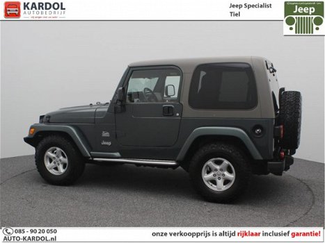 Jeep Wrangler - 4.0 Hardtop & Softtop Sahara | Rijklaarprijs | Airco | Cruise | LM | TH - 1