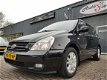 Kia Carnival - 2.7 EX Automaat, 7-Zits, Leder, Cruise - 1 - Thumbnail