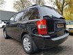 Kia Carnival - 2.7 EX Automaat, 7-Zits, Leder, Cruise - 1 - Thumbnail