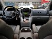 Kia Carnival - 2.7 EX Automaat, 7-Zits, Leder, Cruise - 1 - Thumbnail