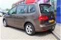 Volkswagen Touran - 1.2 TSI Trendline BlueMotion Airco Trekhaak Cruise c. 4 zgan Allweather banden i - 1 - Thumbnail