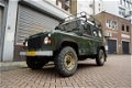 Land Rover Defender - 90 STATIONWAGON 2.3i Benzine AWD * 5 personen - 1 - Thumbnail