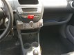 Peugeot 107 - 1.0-12V XS automaat - 1 - Thumbnail
