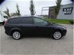 Ford Focus Wagon - 1.8 Titanium Flexi Fuel / Navi / Pdc / Clima / Elek ramen - 1 - Thumbnail