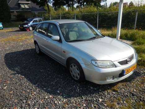 Mazda 323 Fastbreak - 1.6i Touring - 1