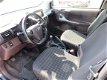 Toyota iQ - 1.0 VVTi Comfort airco navigatie lmv private glass - 1 - Thumbnail