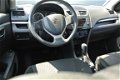 Suzuki Swift - 1.2 94pk 5-DRS AUTOMAAT Comfort - 1 - Thumbnail