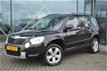 Skoda Yeti - 1.2TSI 105 pk / Airco / Cruise contr / LM velgen - 1 - Thumbnail