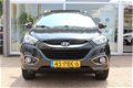 Hyundai ix35 - 2.0I CVVT 2WD I-CATCHER + NAVIGATIE RIJKLAAR - 1 - Thumbnail