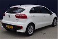 Kia Rio - 1.2 5drs COMFORTLINE AIRCO - 1 - Thumbnail