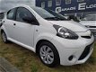 Toyota Aygo - 1.0 VVT-i Now -Parrot - airco- CRUISE -radio- 5drs - 1 - Thumbnail