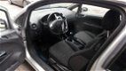 Opel Corsa - 1.2-16V Color Edition NAVI, AIRCO EN LM VELGEN - 1 - Thumbnail