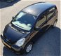 Daihatsu Cuore - 1.0 Clever + Airco - 1 - Thumbnail
