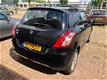 Suzuki Swift - 1.2 Exclusive AIRCO/CRUISECONTROL/SCHUIFDAK/KEYLESGO/BLUETOOTH/USB - 1 - Thumbnail