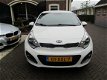 Kia Rio - 1.2 CVVT Plus Pack, Airco, Lichtmetalen velgen, 1e Eigenaar - 1 - Thumbnail