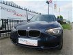 BMW 1-serie - 116i SPORT AUTOMAAT/ECC/PDC/140PK - 1 - Thumbnail