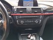 BMW 3-serie - 320i SPORT Aut8 Business Navi Pdc Sportstoelen - 1 - Thumbnail