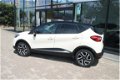 Renault Captur - DYNAMIQUE-90PK-NAVI-CLIMA-PDC-CAMERA-KEURIG - 1 - Thumbnail