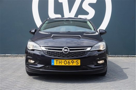 Opel Astra Sports Tourer - 1.4 TURBO Online Edition - CLIMATE - NAVI - AGR STOEL - PARKEERHULP - 1