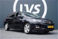 Opel Astra Sports Tourer - 1.4 TURBO Online Edition - CLIMATE - NAVI - AGR STOEL - PARKEERHULP - 1 - Thumbnail