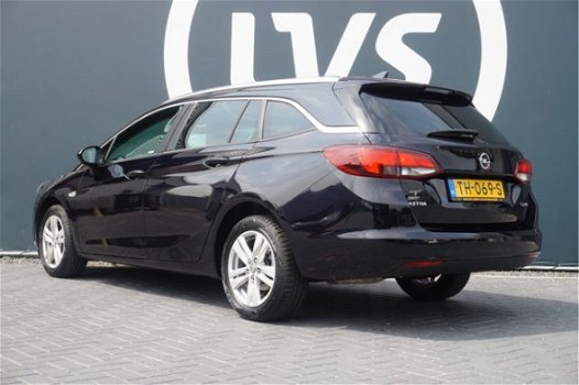 Opel Astra Sports Tourer - 1.4 TURBO Online Edition - CLIMATE - NAVI - AGR STOEL - PARKEERHULP - 1