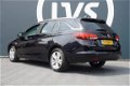 Opel Astra Sports Tourer - 1.4 TURBO Online Edition - CLIMATE - NAVI - AGR STOEL - PARKEERHULP - 1 - Thumbnail