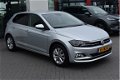 Volkswagen Polo - 1.0 TSI Highline Navi, Clima, stoelverw, lmv, parksens v en a, regensens, spiegelp - 1 - Thumbnail