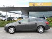 Opel Astra Sports Tourer - 1.4 TURBO/ 140PK/ NAVI/ PDC/ TREKHAAK / INCL. 6 MND BOVAG GARANTIE/ 1E EI - 1 - Thumbnail