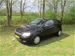 Opel Corsa - 1.2-16V Rhythm - 1 - Thumbnail