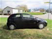 Opel Corsa - 1.2-16V Rhythm - 1 - Thumbnail