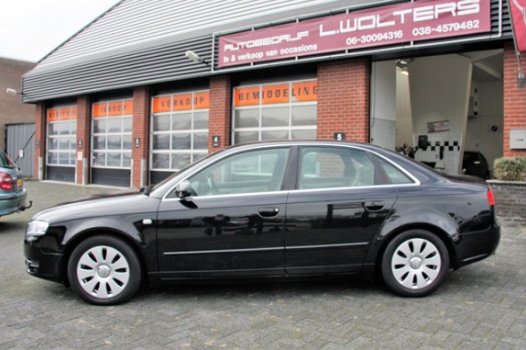 Audi A4 - 2.0 Advance airco/leder/navi/autm/cruis/PDC - 1