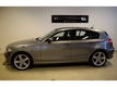 BMW 1-serie - 116i Executive Airco Climate Navigatie Stoelverw - 1 - Thumbnail